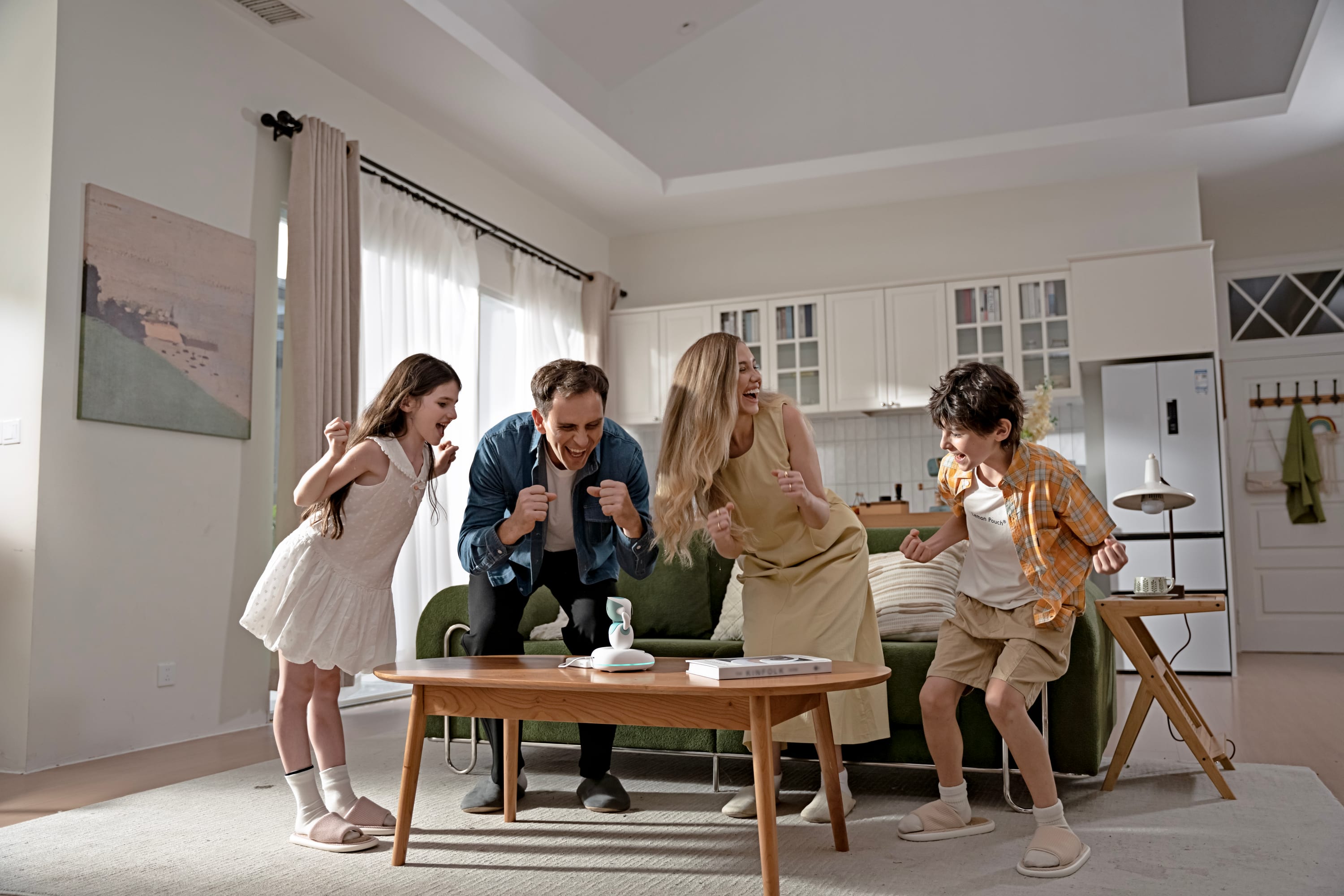 Family playing with Eilik and the AI Station at home
